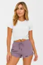Short morado mujer